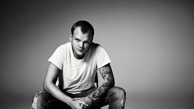 Black-and-white photo of late Swedish DJ/producer Avicii A.K.A. Tim Bergling.