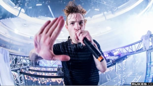 Rusko performs on stage