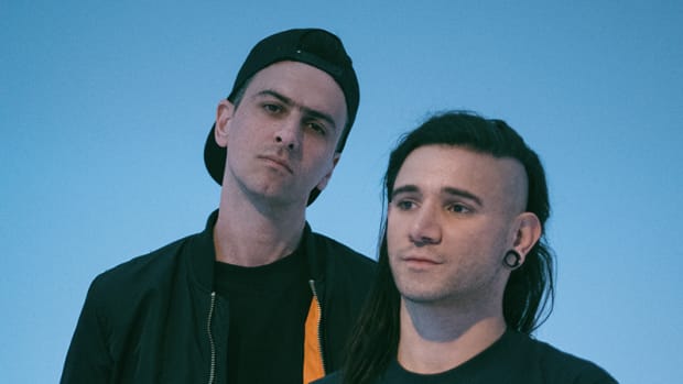 A press photo of Dog Blood, a duo comprised of DJ/producers Skrillex (real name Sonny Moore) and Boys Noize (real name Alexander Ridha).