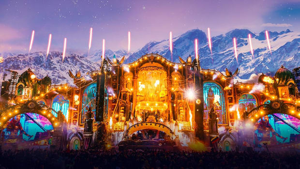 Tomorrowland Winter's 2019 main stage with fireworks or pyrotechnics going off.
