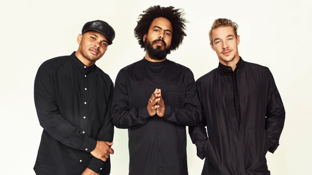 A press photo of Diplo's Major Lazer project with J Balvin in the photo.