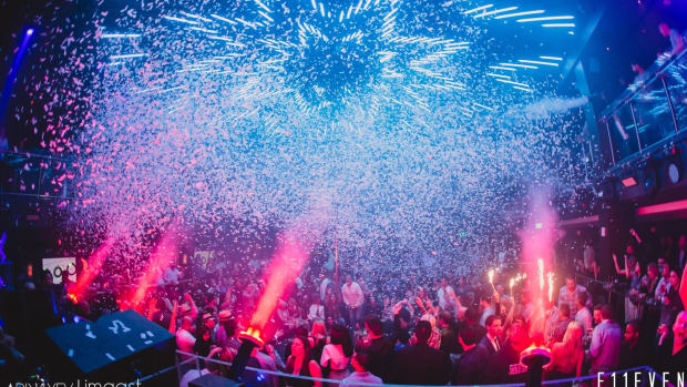 Miami nightclub E11EVEN with confetti cannons shooting over a crowd.