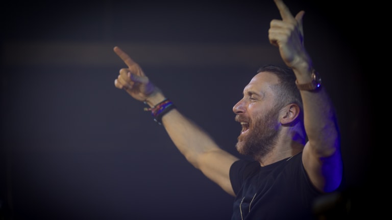 Watch David Guetta Shower the Louvre in Lights in Breathtaking NYE Charity Performance