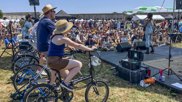 Attendees Pedal for Power In First Bike-Driven Music Festival Stage Setup