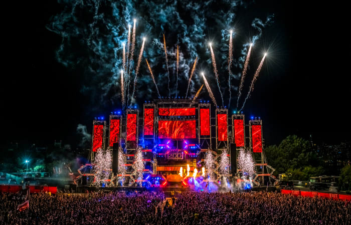 Fireworks erupt over the main stage at Electric Zoo