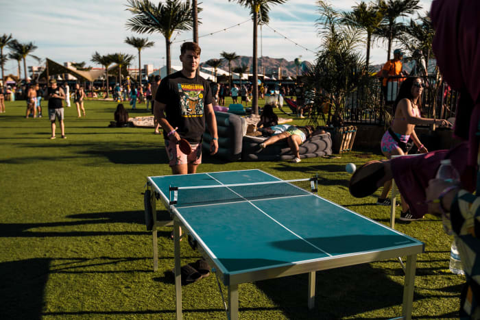 EDC Vegas 2021 attendees play pingpong on the Mesa.