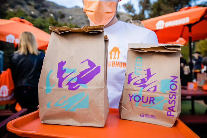 A staff member serves Taco Bell at the "Grubhub presents Sound Bites with Zedd and Big Wild" event on October 22nd, 2021.