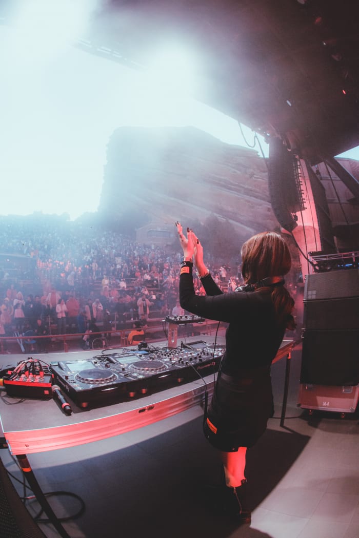 Qrion performs at Colorado's iconic Red Rocks Amphitheater.