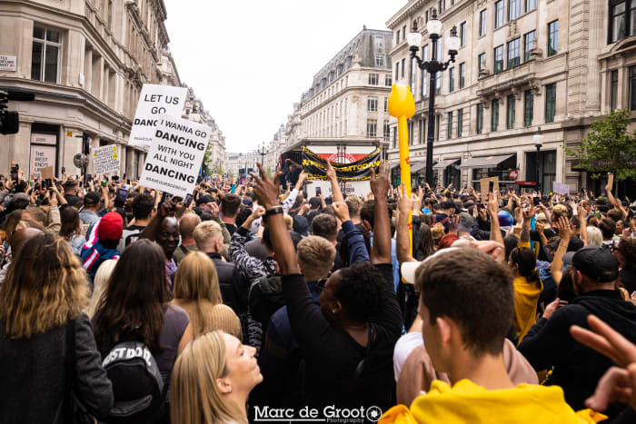 Protesters gather at Save Our Scene's #FreedomToDance event in London.