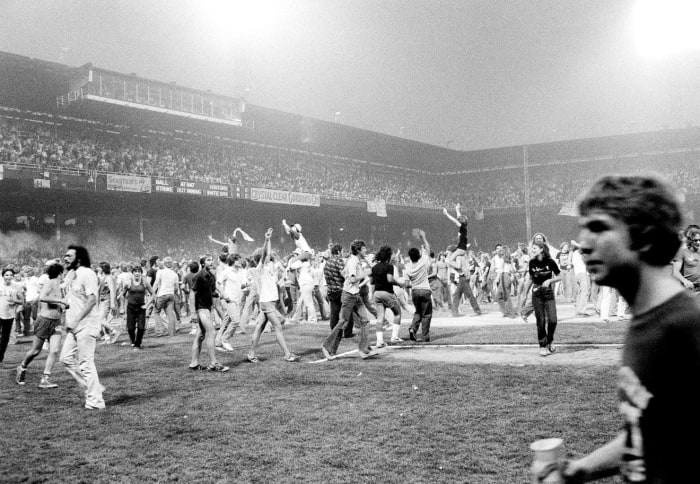 Over 5,000 fans stormed the field at Chicago's Comiskey Park on July 12th, 1979 in a riot following the burning and explosion of disco records.