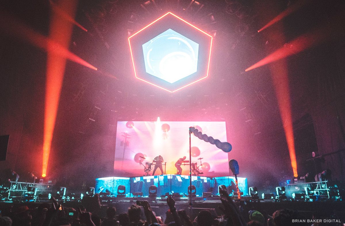 Want to see ODESZA's multi-million dollar production? Too bad! Here's a condom on a stick. 