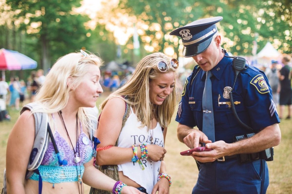 electric forest cop helping girls