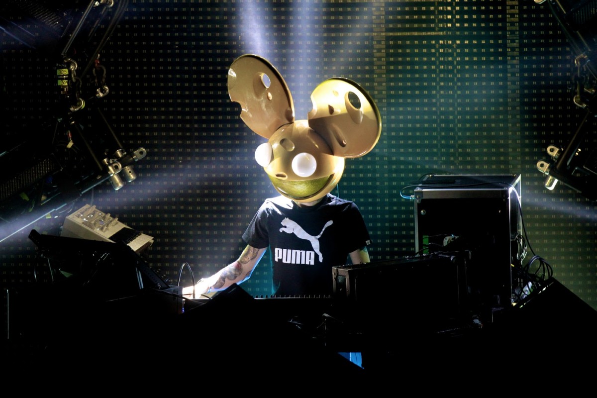 deadmau5 wearing mau5head during a DJ performance.