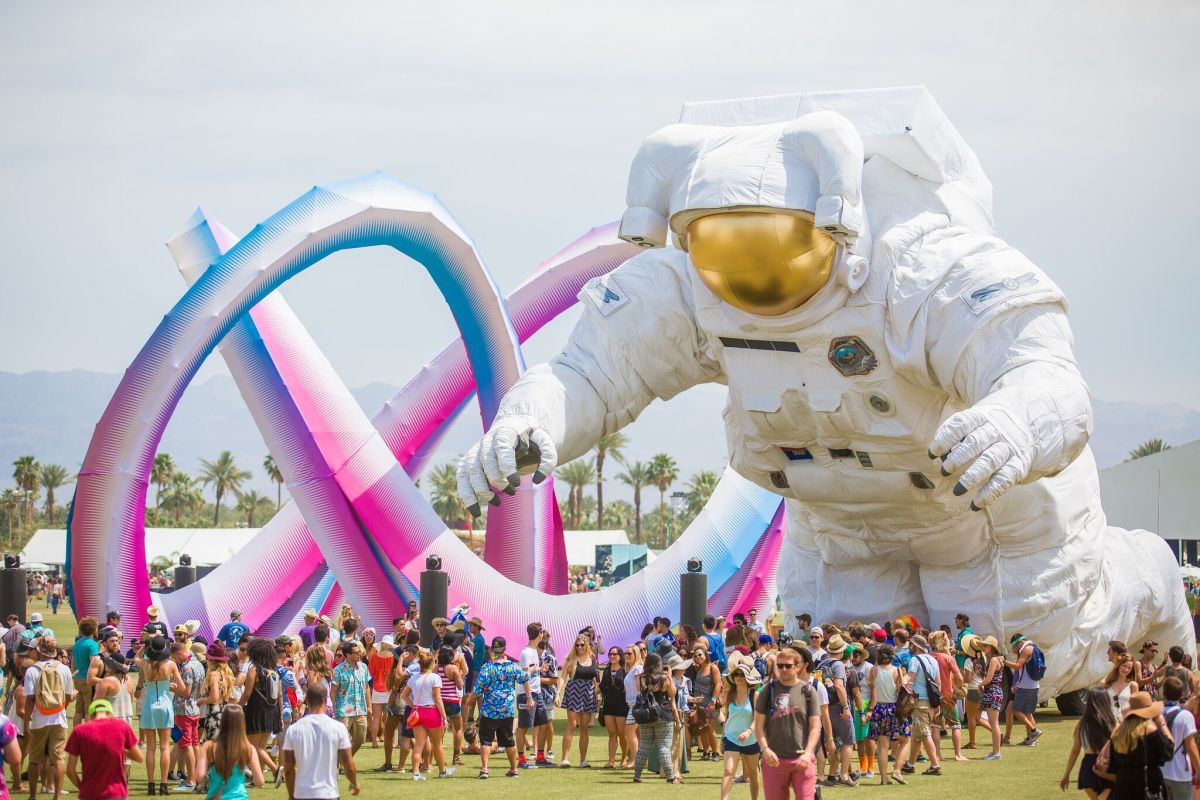 A photo of an astronaut art installation as well as a more abstract sculpture at Coachella Valley Music and Arts Festival.