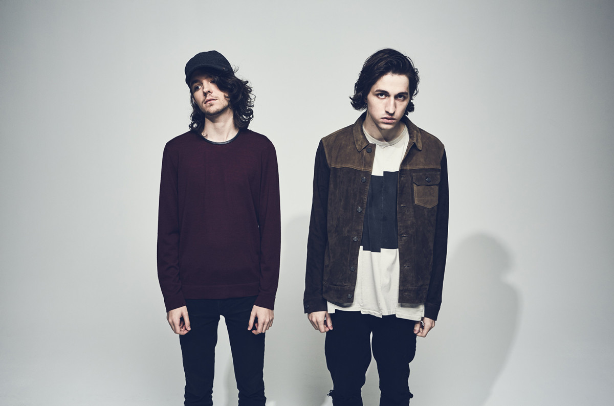 A press photo of DJ/producers Porter Robinson and Madeon.