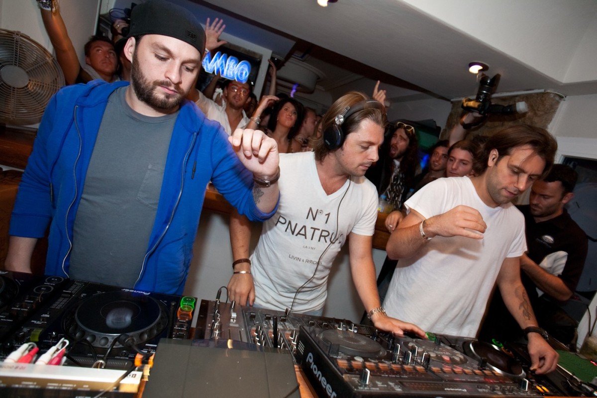 Steve Angello, Axwell, and Sebastian Ingrosso of Swedish House Mafia perform at Café Mambo Ibiza in 2011.