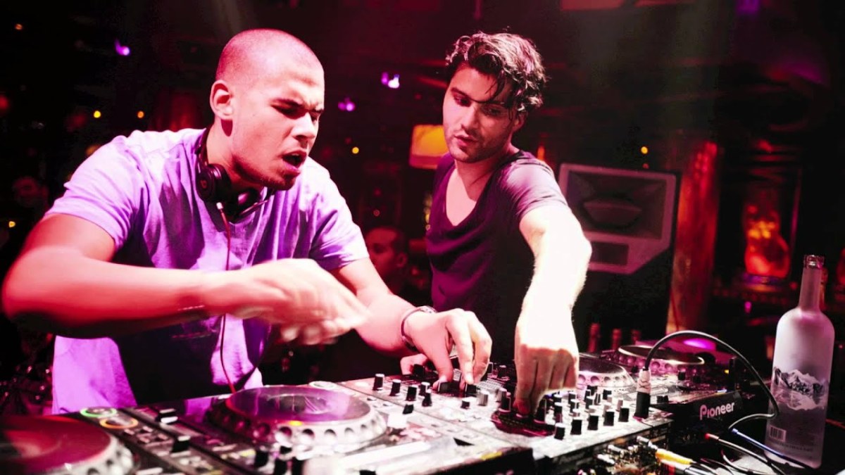Afrojack and R3HAB performing together in 2012.