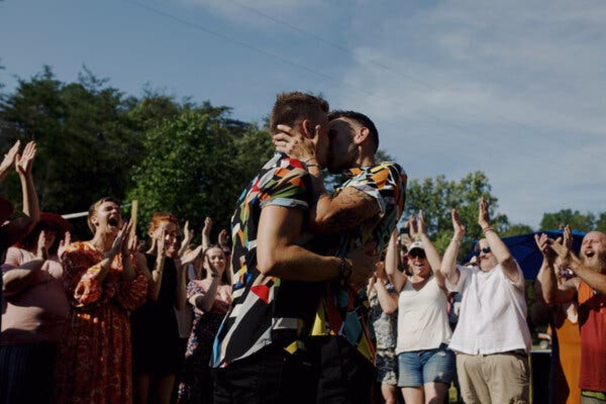 Jamon Deaver and Joey Lawton embrace at Wonder Woods.